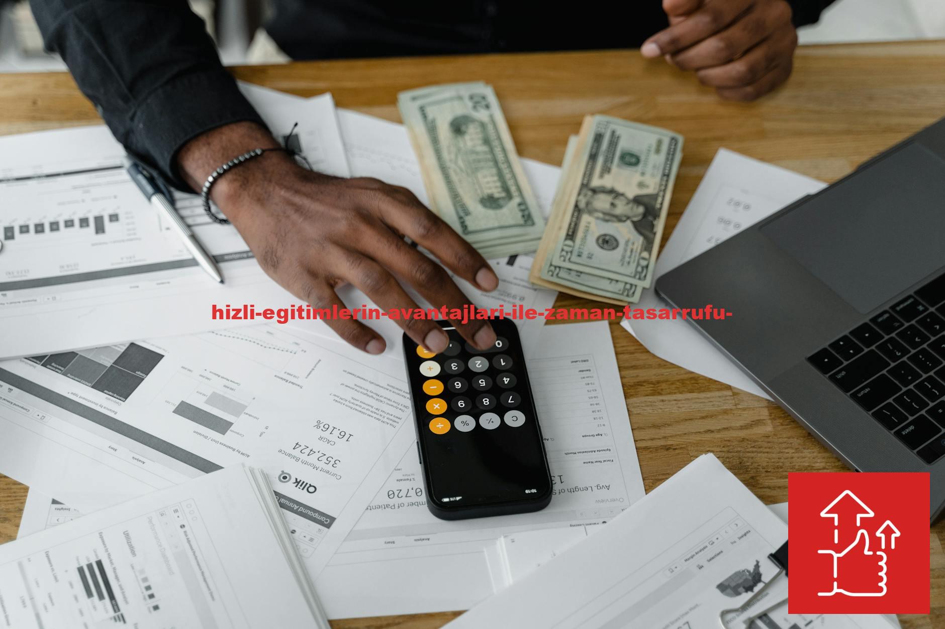 Overhead view of financial documents with calculator, cash, and laptop for financial planning.