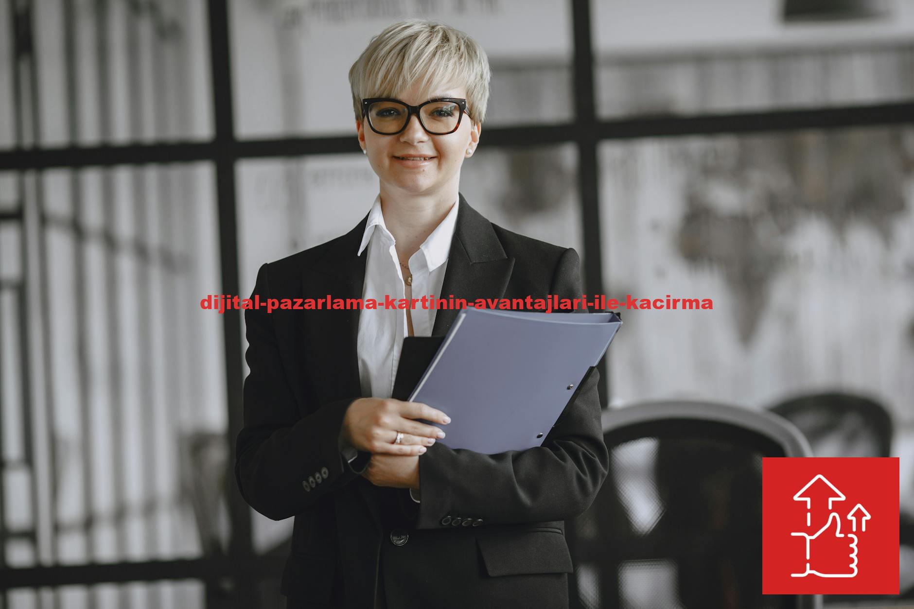 Professional woman in a suit holding a folder in a modern office setting.