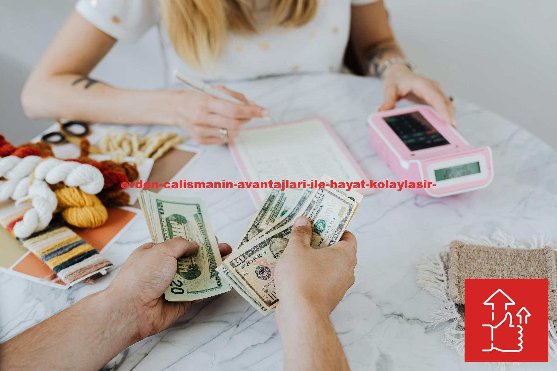 Two people handling cash and budgeting with a calculator and notebook at a table.